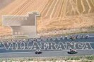 25689